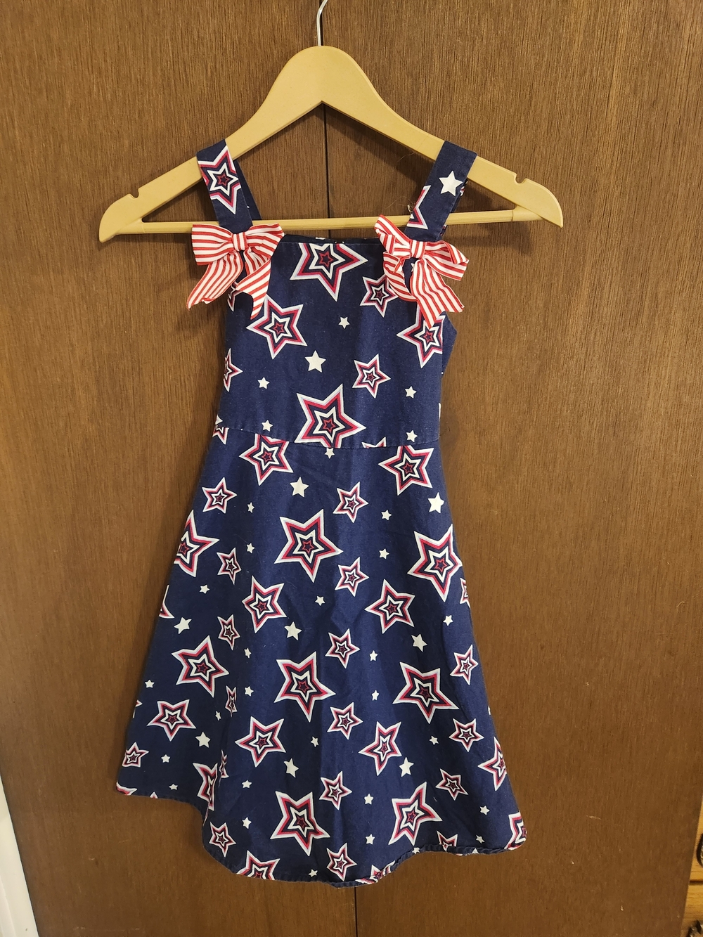 Jessica Ann Navy Star Print Dress with Red Bow Straps